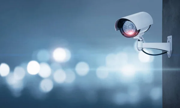 media-depositphotos_356520526-stock-photo-close-cctv-camera-defocused-background